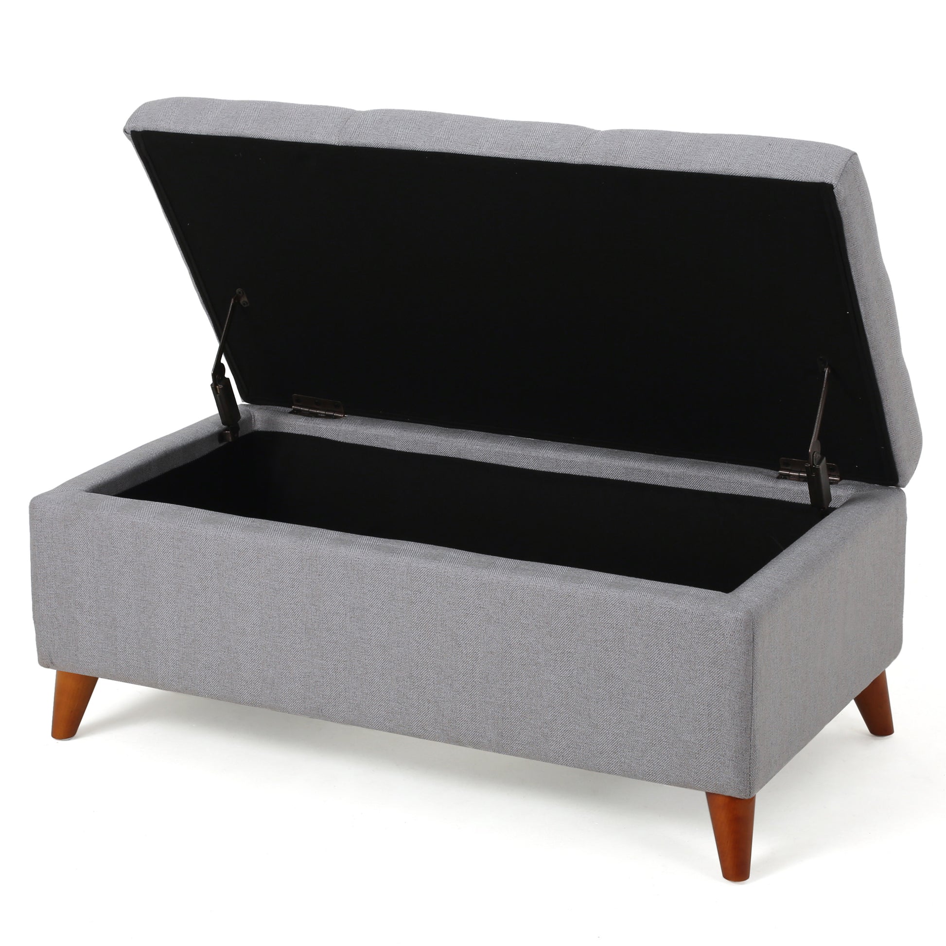 Grey upholstered storage ottoman with tufted lid and wooden legs