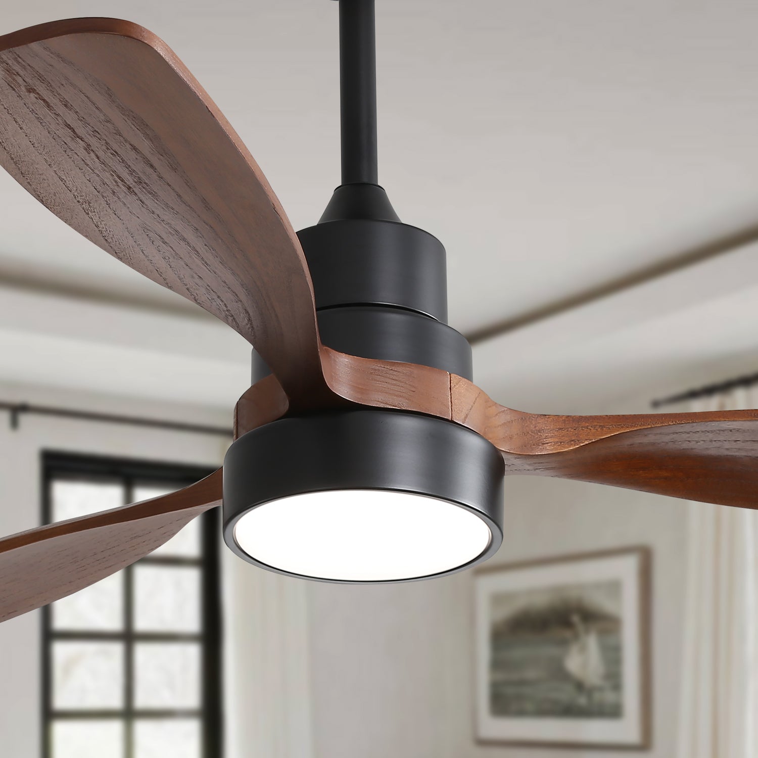 Modern black ceiling fan with three dark woodgrained blades and integrated LED light