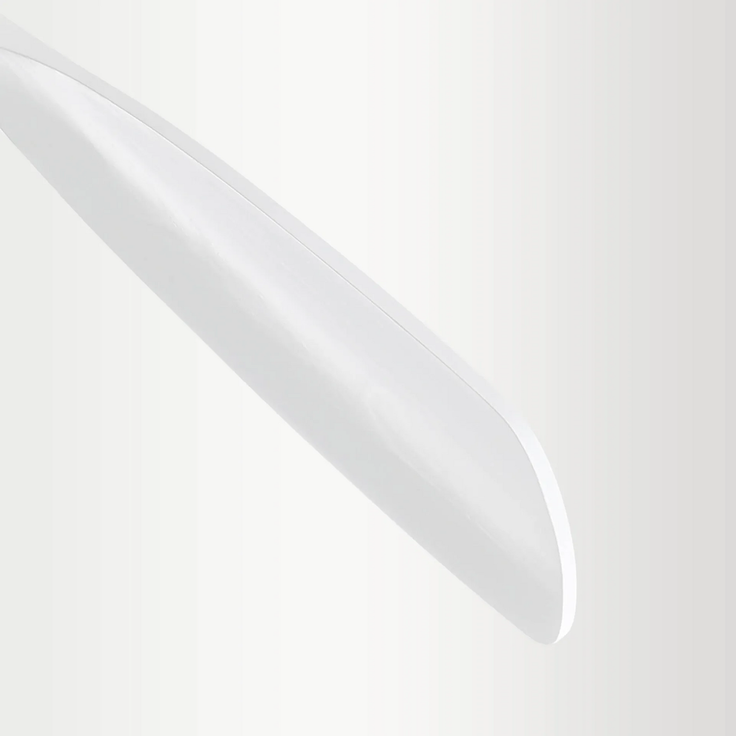 Sleek white modern desk lamp with adjustable arm and metallic base