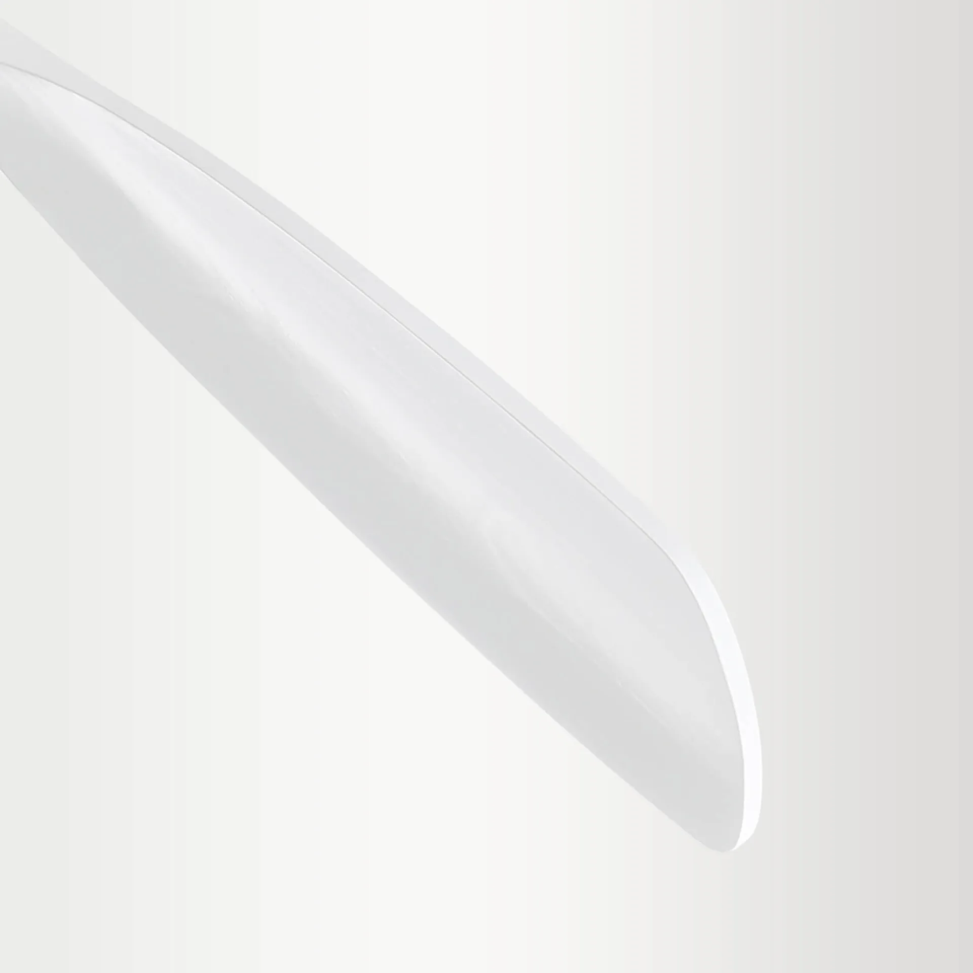 Sleek white modern desk lamp with adjustable arm and metallic base