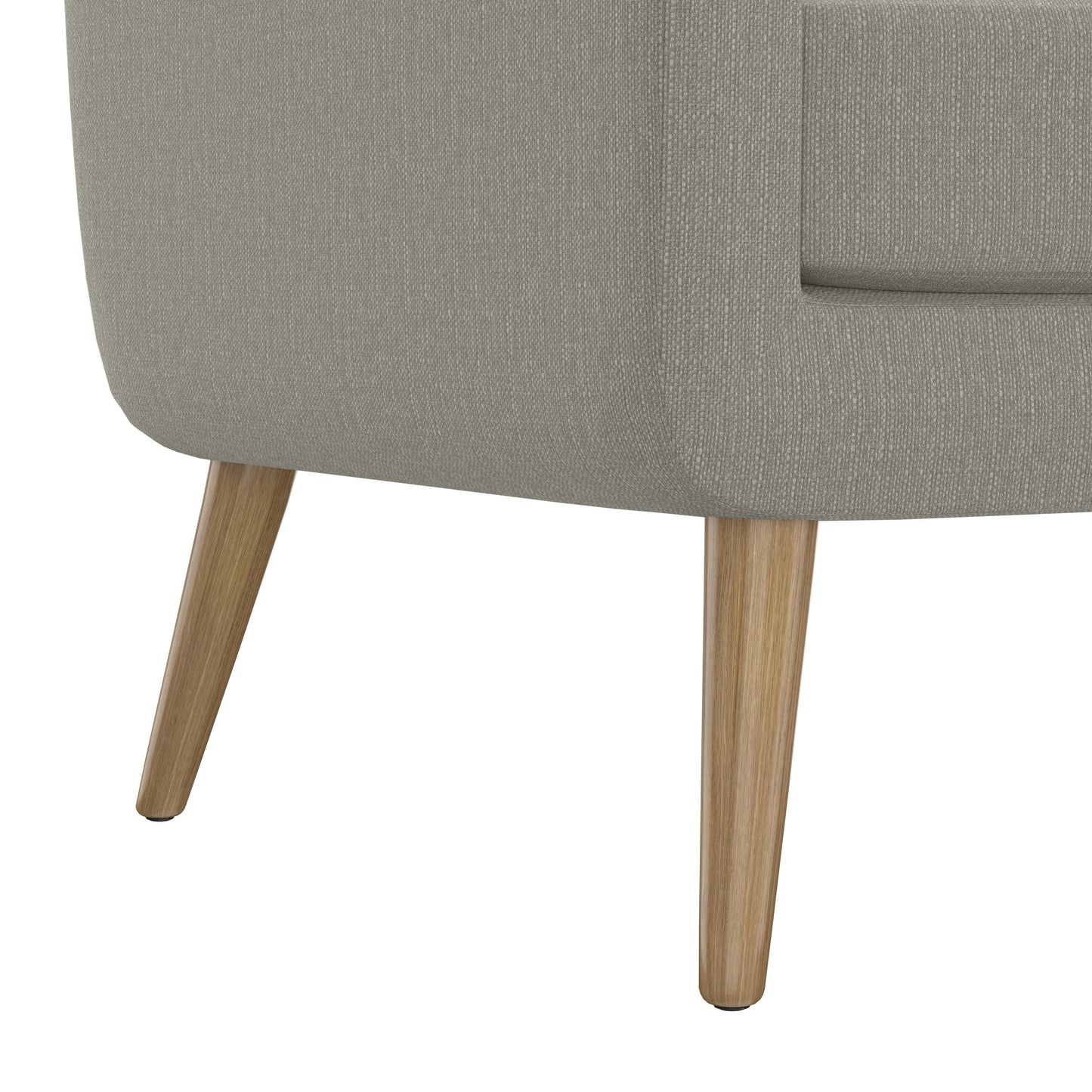 Closeup of a grey textured fabric armchair with tapered wooden legs ideal for modern living rooms