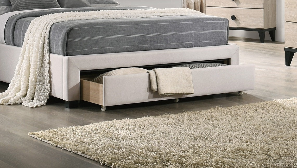 Light beige upholstered storage bed frame with a pullout drawer