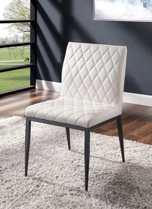 Diamondtufted cream faux leather dining chair with slim black metal legs