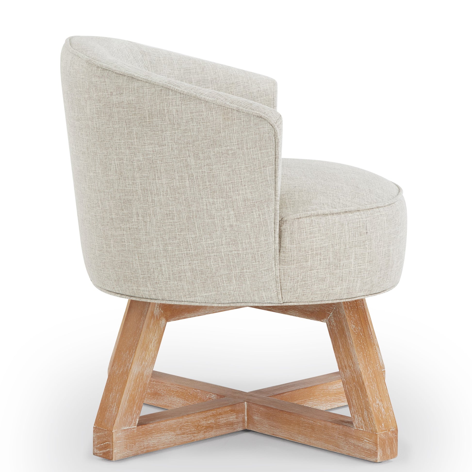 Neutral linen upholstered accent chair with a curved back and wooden crisscross base