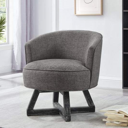 Gray fabric swivel accent chair with a curved back and a distressed black wooden base