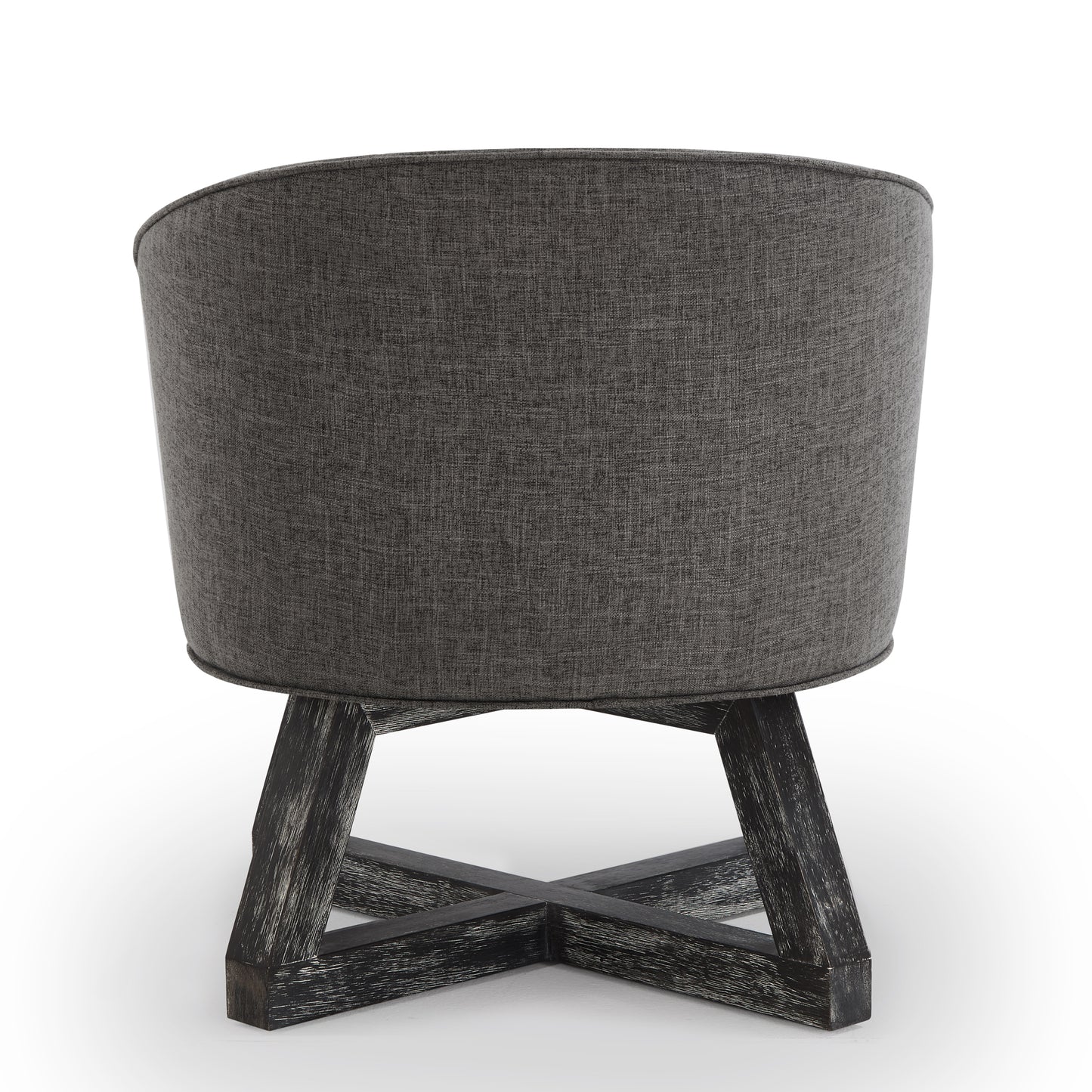 Back view of a grey upholstered barrel chair with distressed black wooden legs