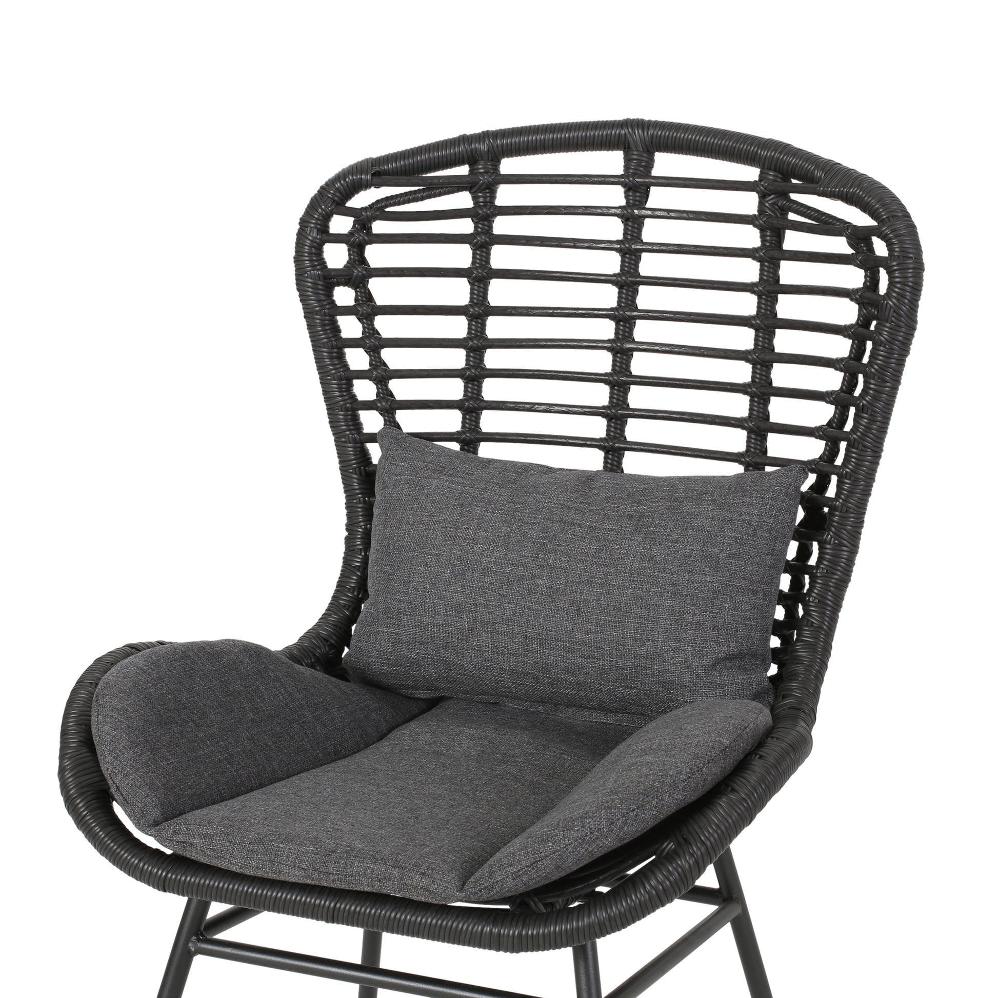 Black rattan outdoor chair with grey cushions and high back