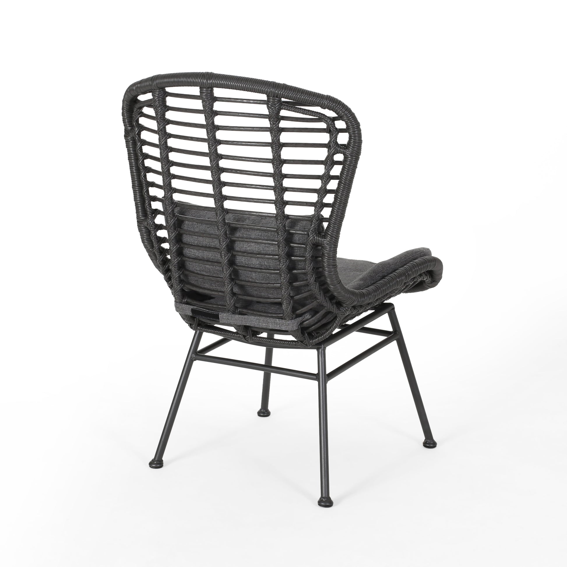 Dark gray rattan chair with a comfortable seat cushion and metal legs