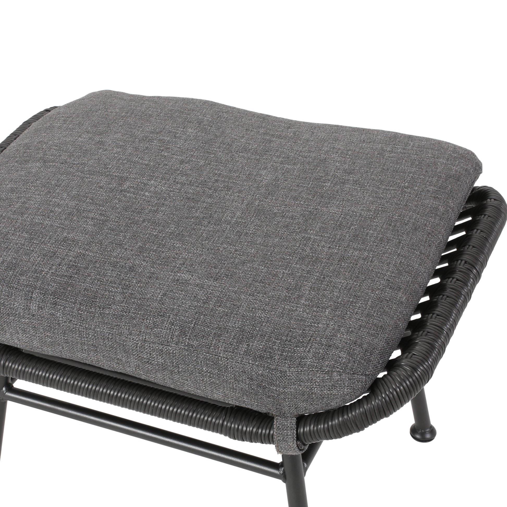 Gray upholstered ottoman with woven dark gray frame and black metal legs