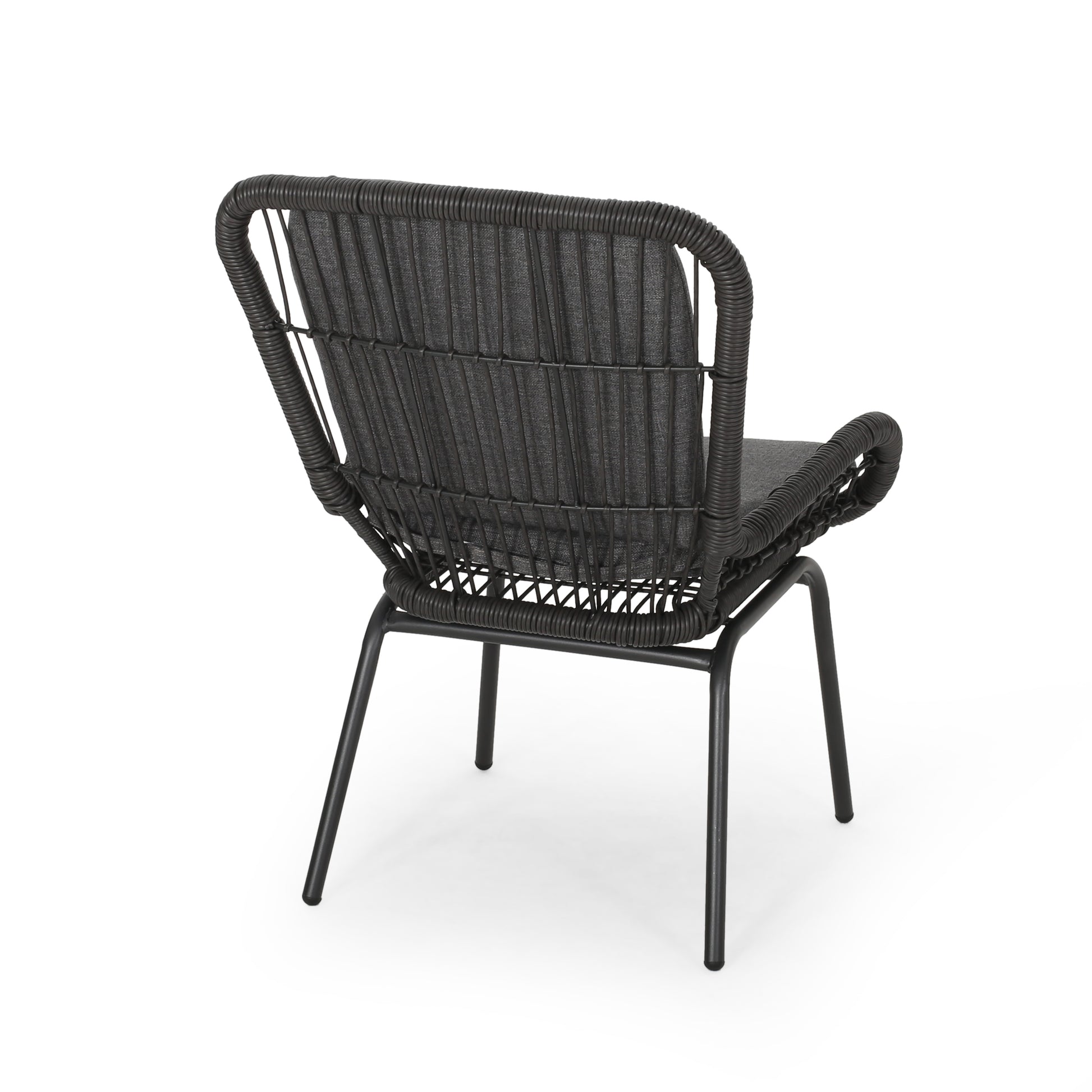 Dark grey woven rattan outdoor armchair with black metal legs and a padded seat