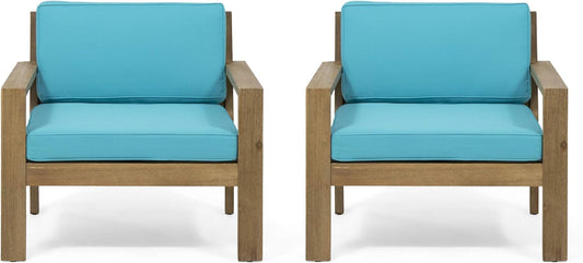 Two modern outdoor chairs with teal cushions and wooden frames