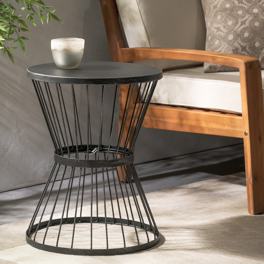 Black metal wire outdoor accent table with a round top ideal for patios
