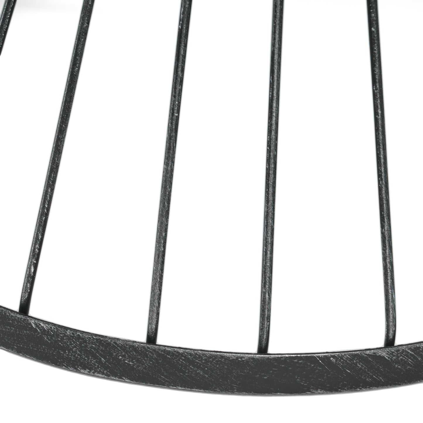 Closeup of a dark metal wire basket rim with vertical bars industrial style