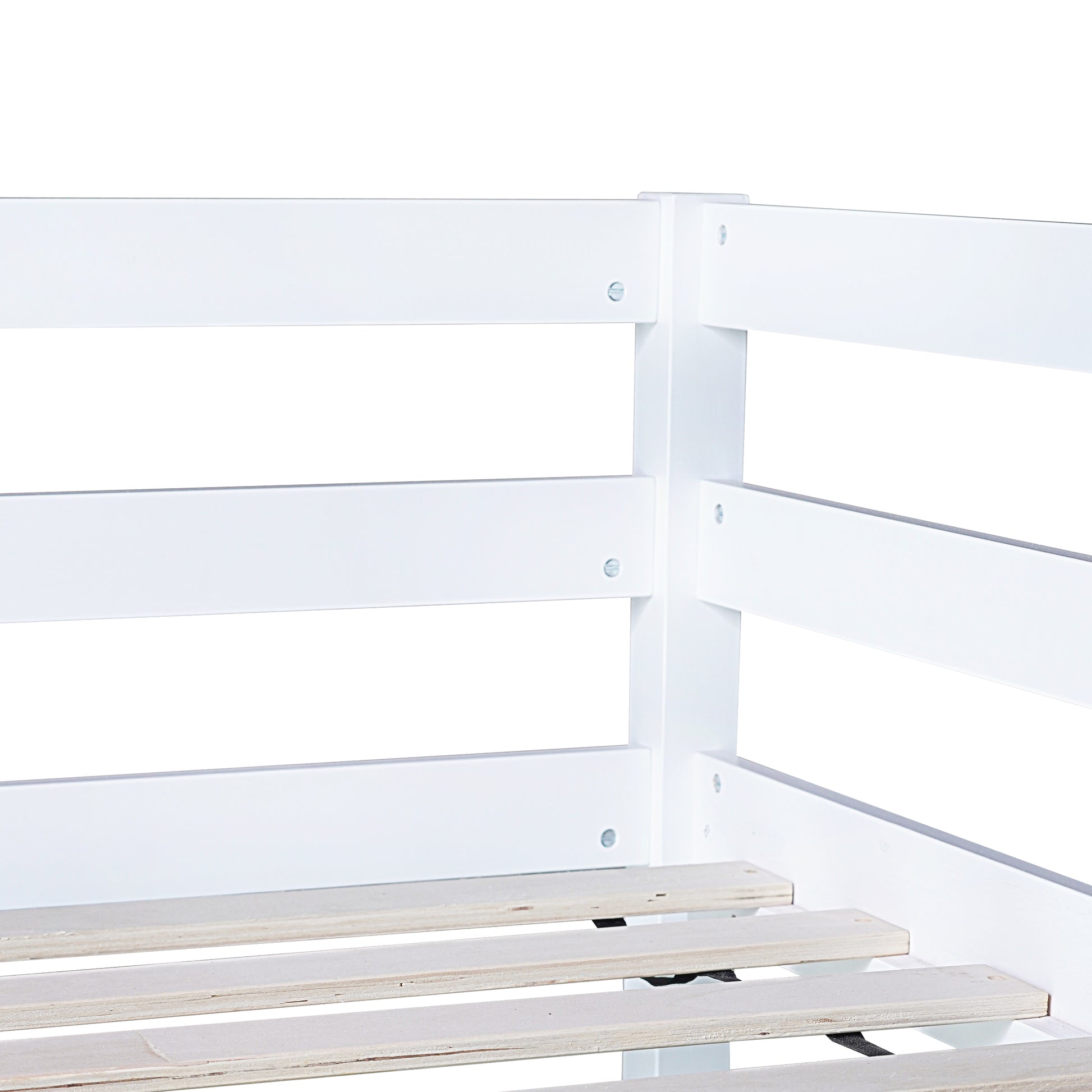 Closeup of a white wooden bunk bed frame with slatted base showing sturdy construction for childrens safety