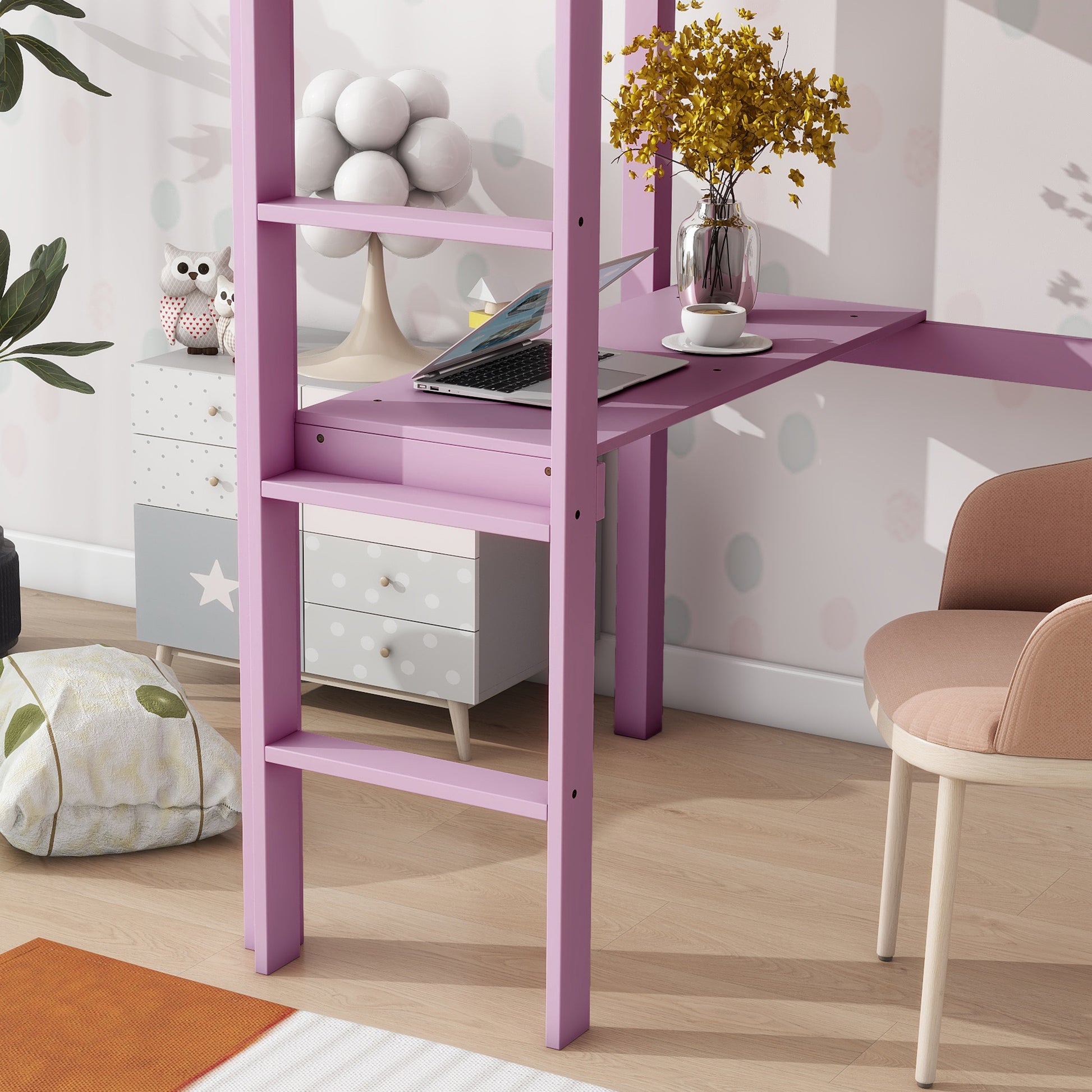 Purple loft bed desk with laptop and coffee cup