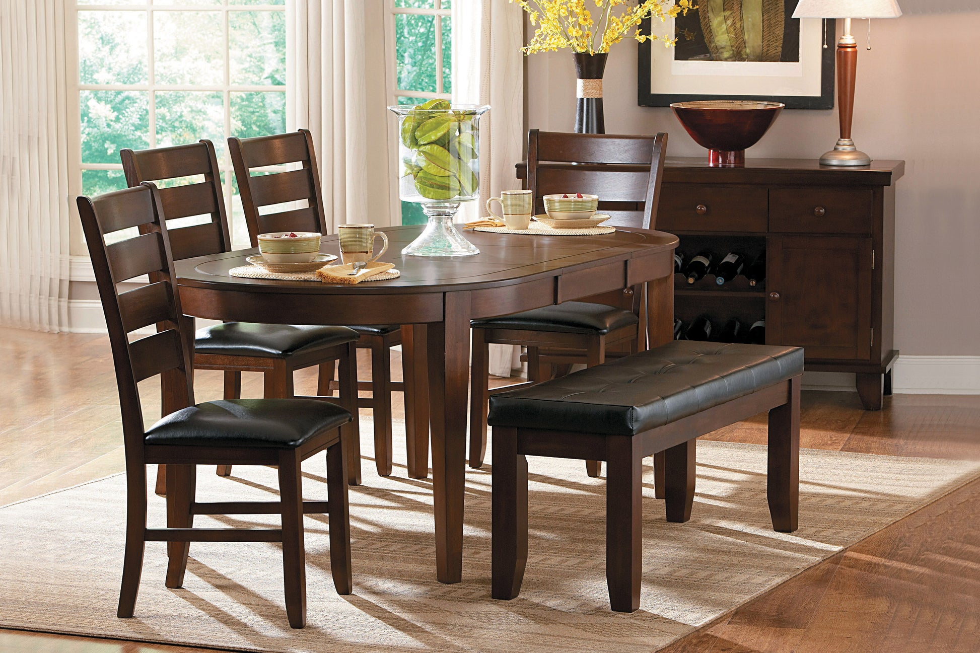 Dark wood dining table with upholstered chairs and bench