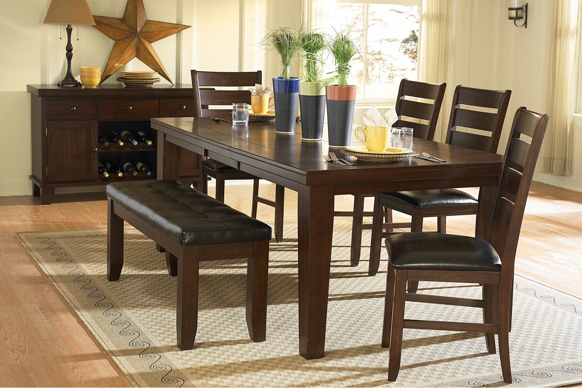 Dark wood dining table with leather bench and chairs