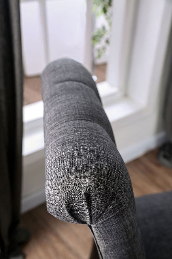 Dark gray textured fabric armchair armrest detail