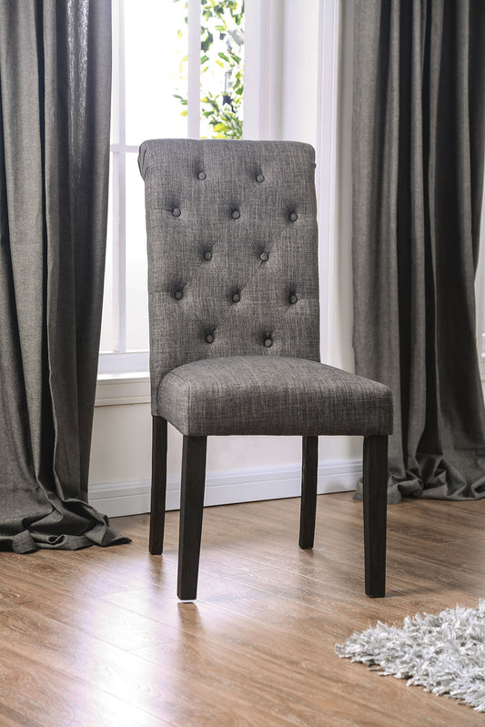 Tufted back dining chair with dark gray fabric and wooden legs