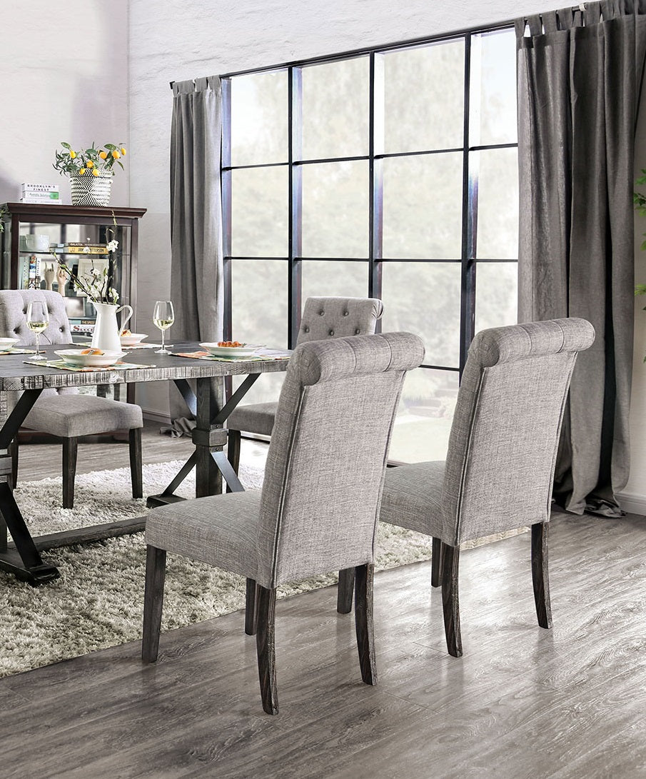 Tufted back dining chair in light gray fabric with dark wood legs