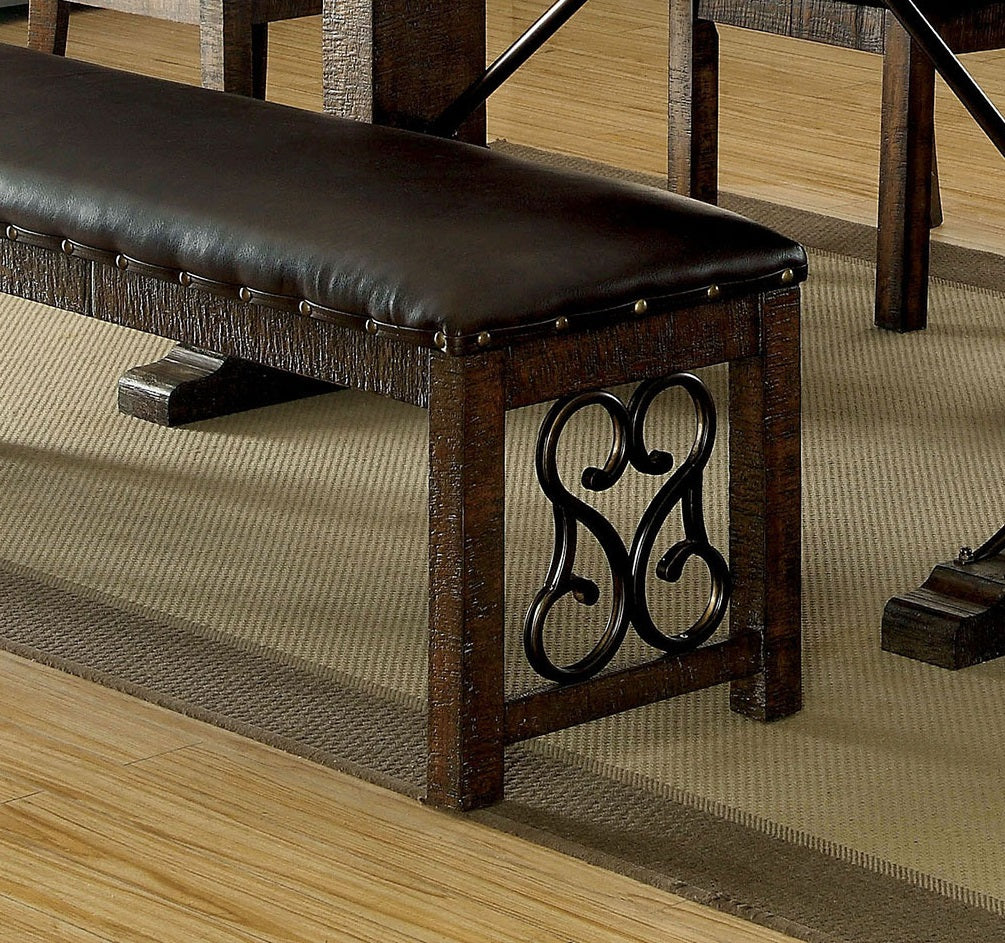 Dark brown faux leather dining bench with studded trim and scrolled metal accents