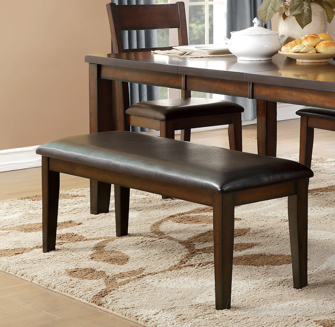 Dark brown faux leather dining bench with wooden frame