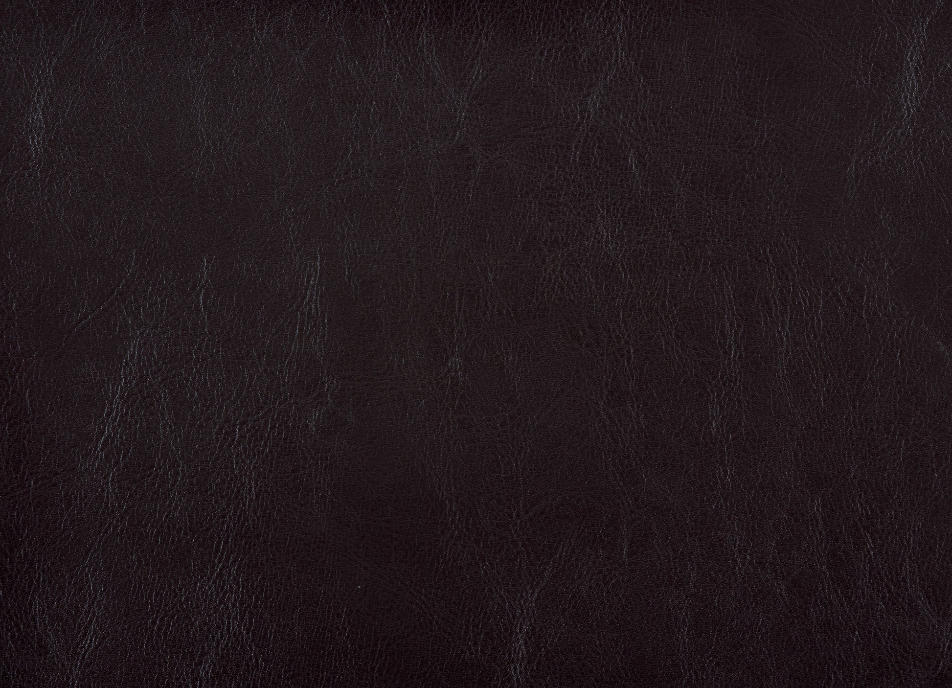 Dark brown faux leather texture detail for upholstery