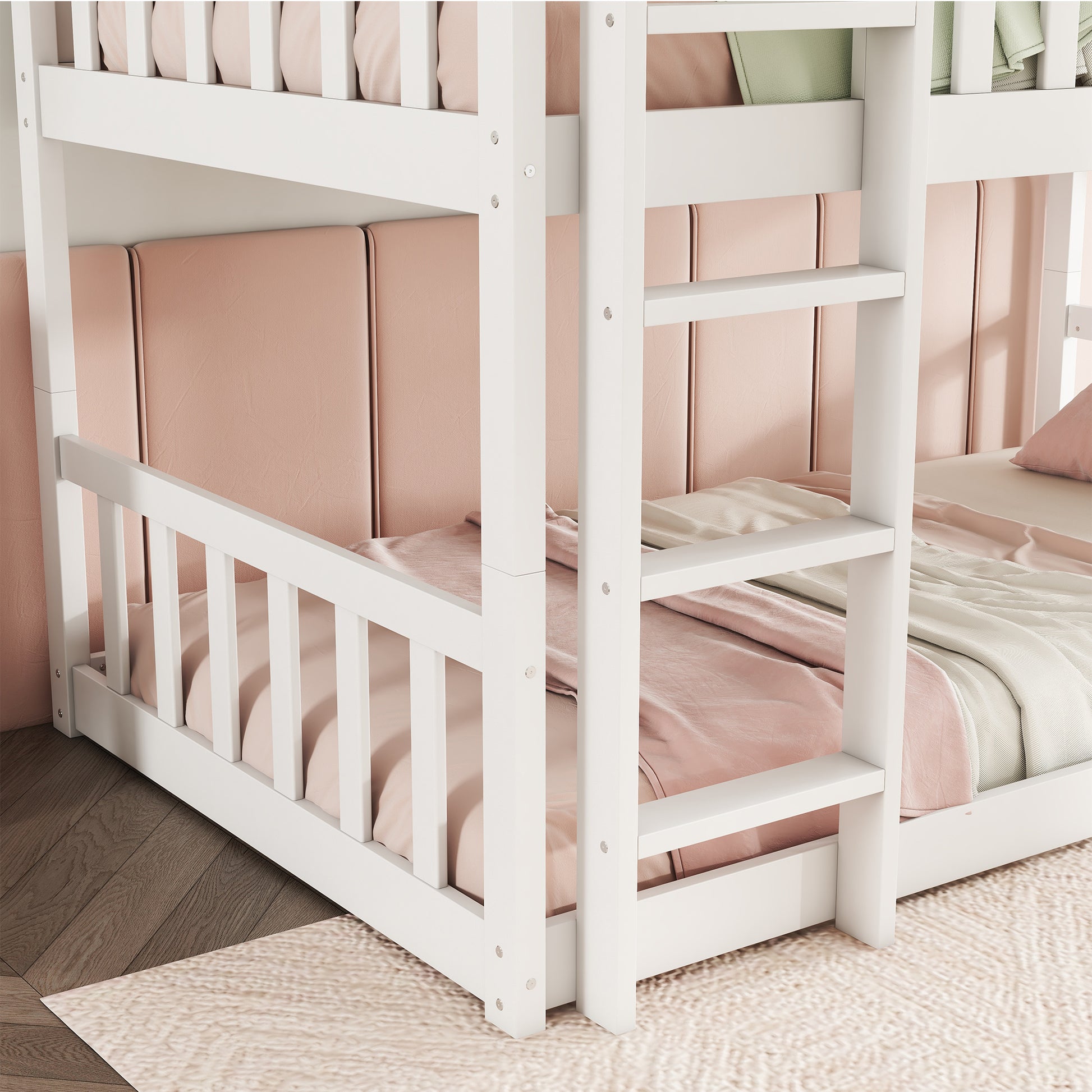 White wooden twin over twin bunk bed with pink upholstered headboards