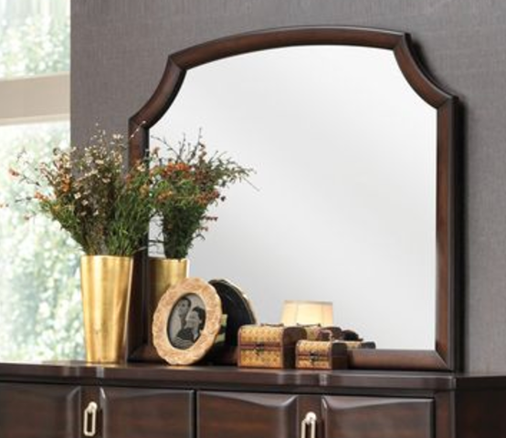 Arched dark wood vanity mirror with decorative trim