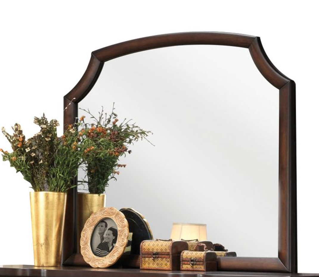 Dark wood arched mirror with ornate frame