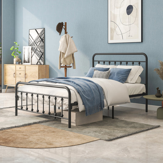 Black metal full bed frame with rounded headboard and footboard featuring clean lines and ornate finials