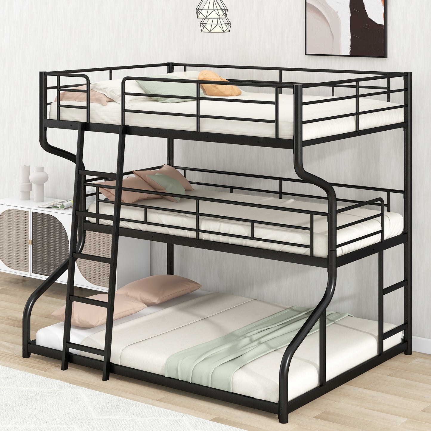 Black metal triple bunk bed with white mattresses and pillows