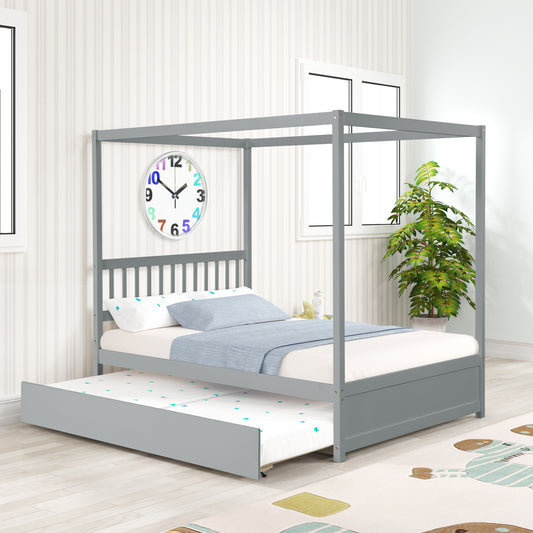 Grey wood canopy bed with a pullout trundle