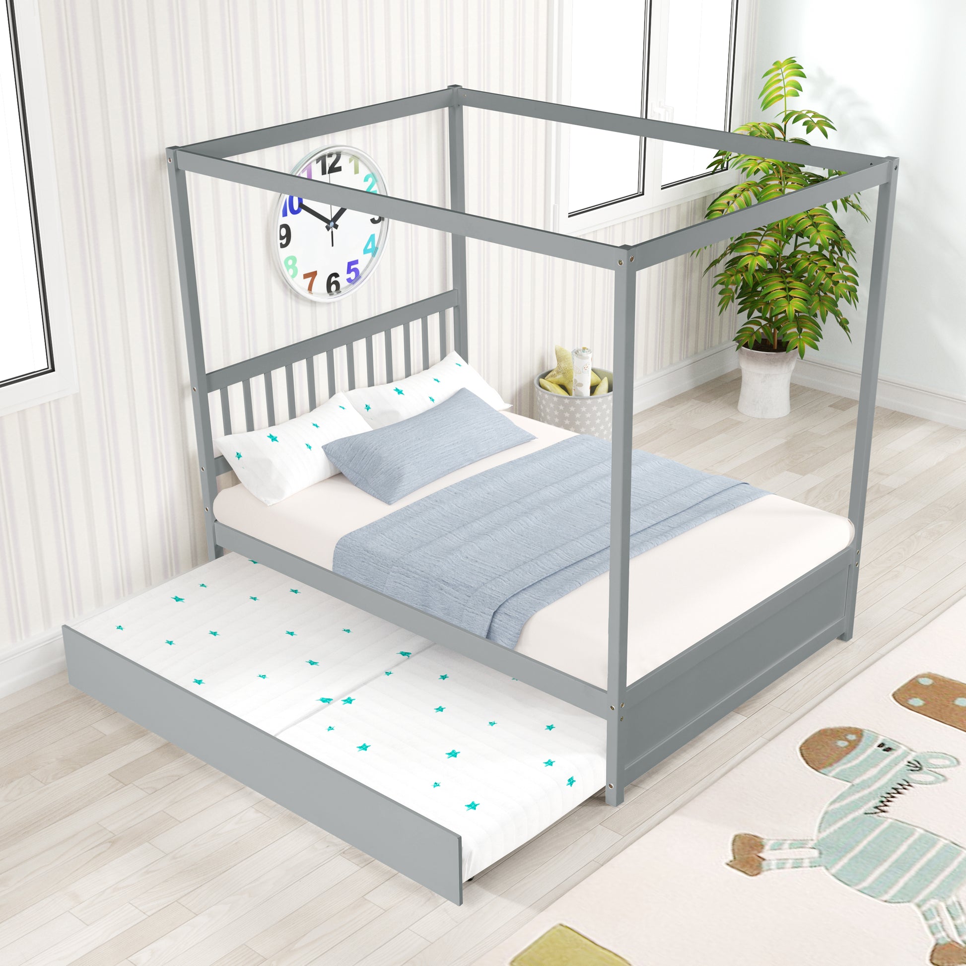 Gray metal canopy bed with trundle featuring slatted headboard and blue bedding