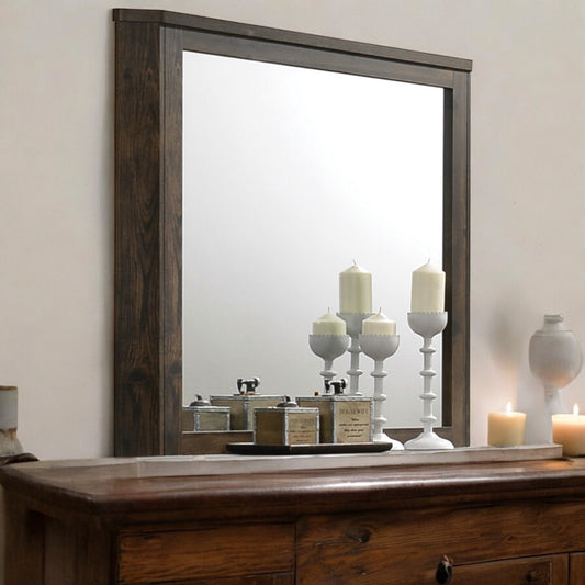 Dark wood framed mirror with rustic finish