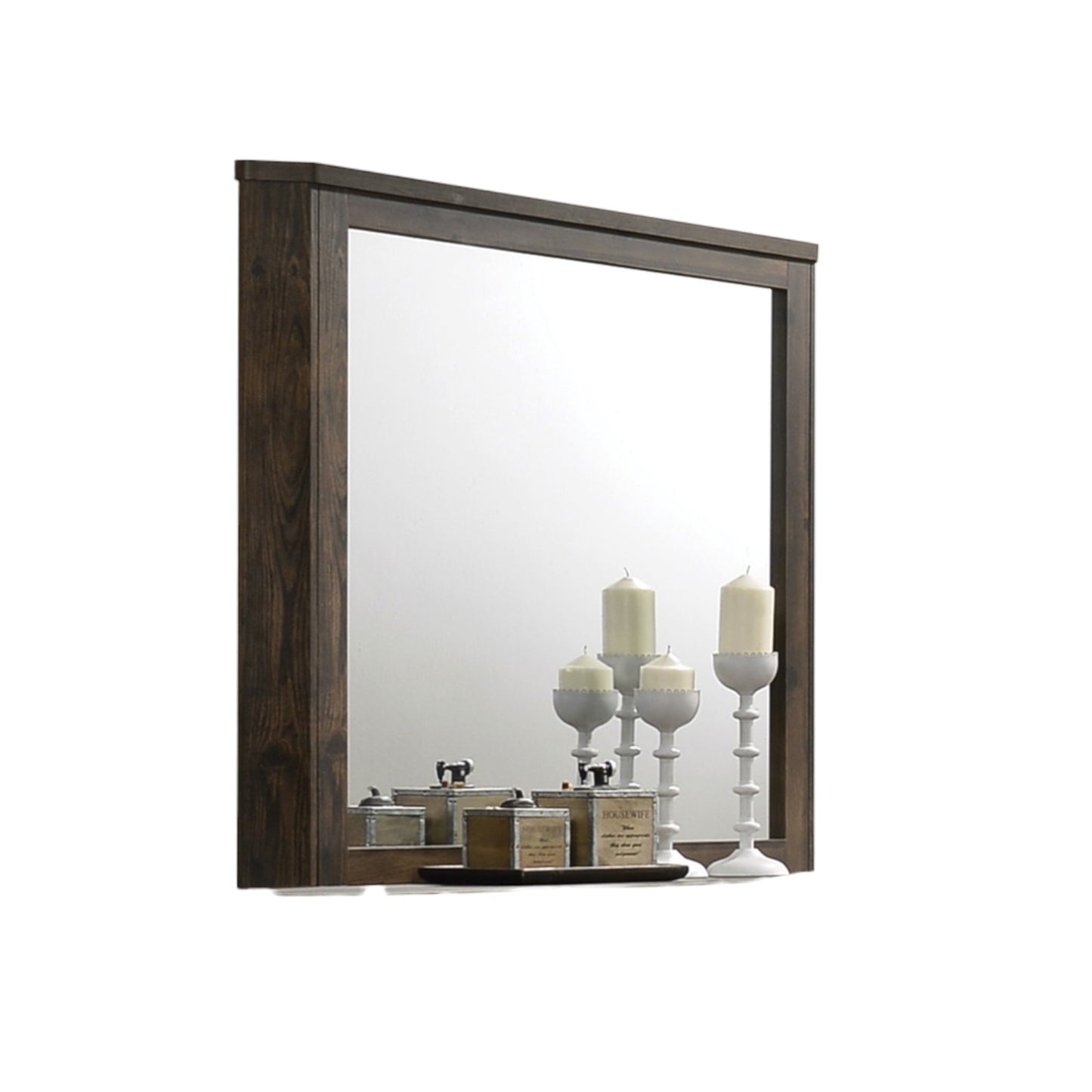 Dark wood framed wall mirror with ornate candle holders reflected