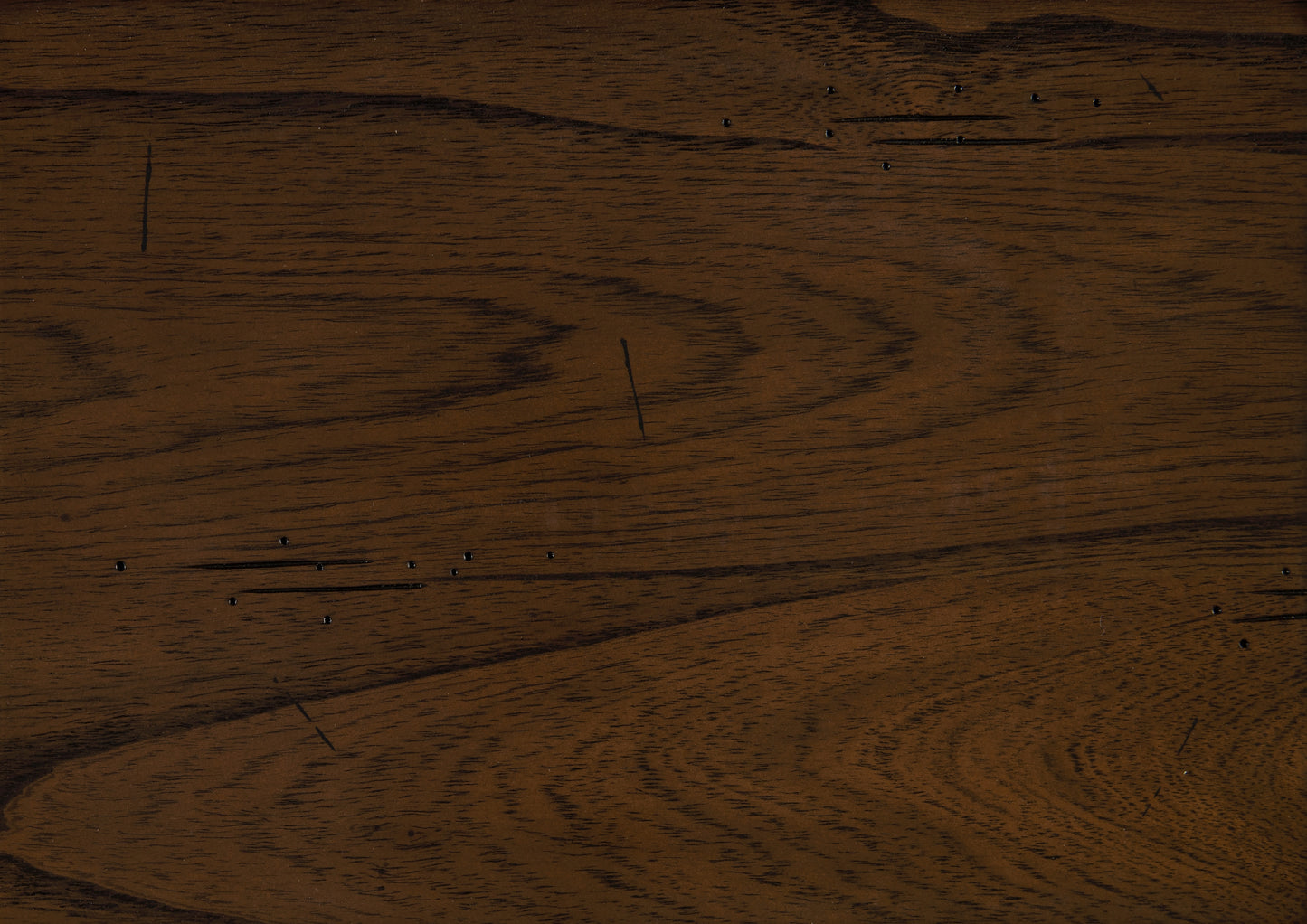 Dark brown stained oak wood veneer with visible grain and minor imperfections for furniture