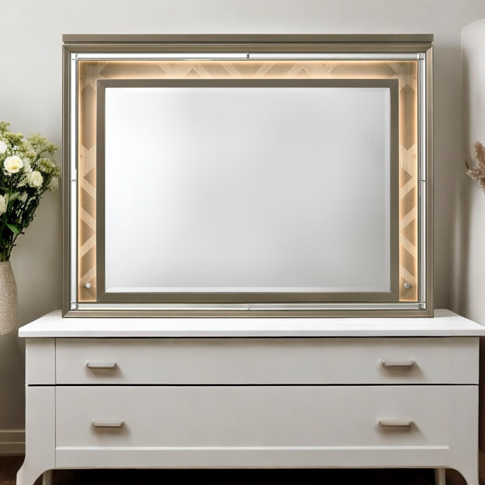 Modern rectangular wall mirror with integrated LED lighting and geometric bronze frame