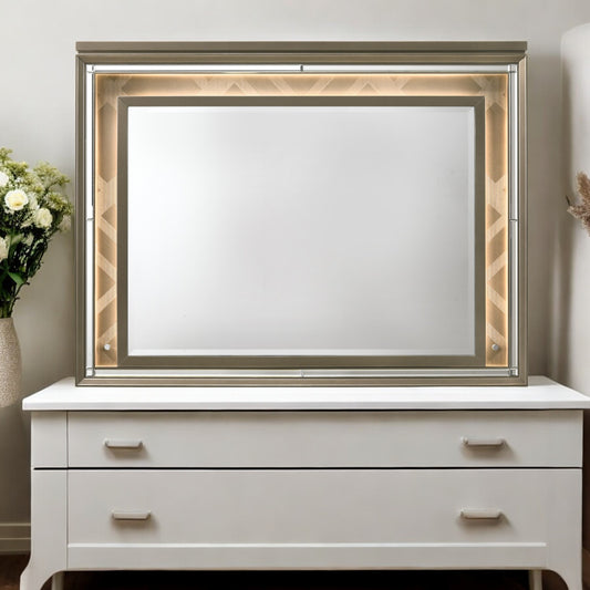 Modern rectangular wall mirror with integrated LED lighting and geometric bronze frame