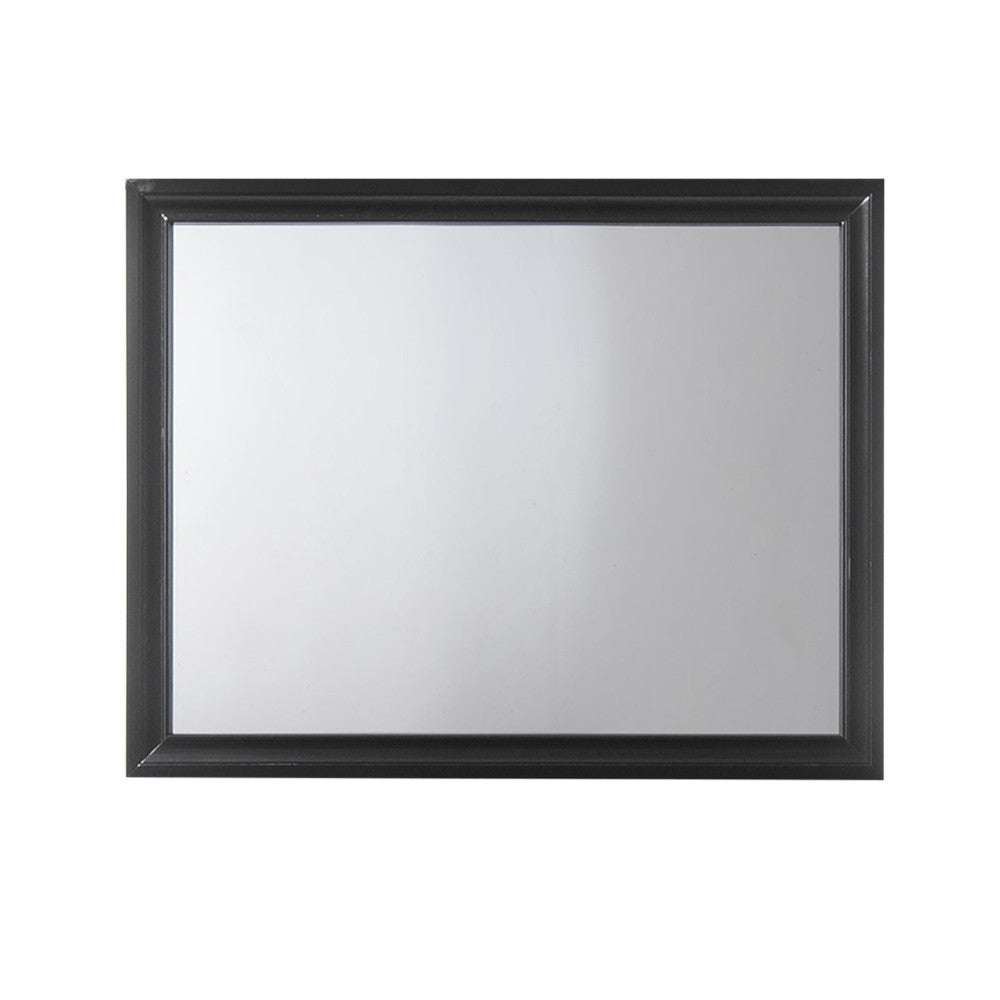 Rectangular black framed wall mirror with clear reflection