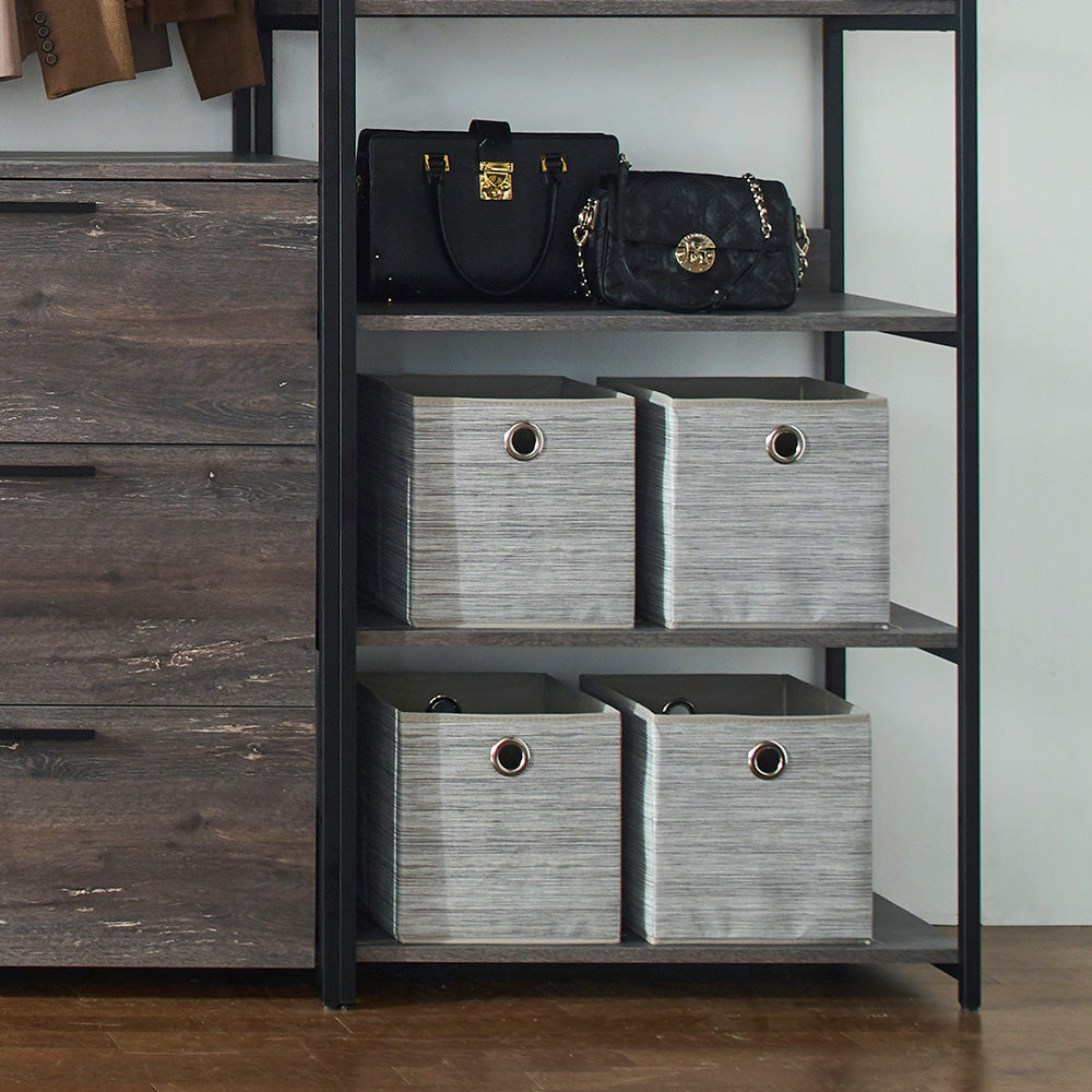 Four grey fabric storage cubes with handles on a shelf