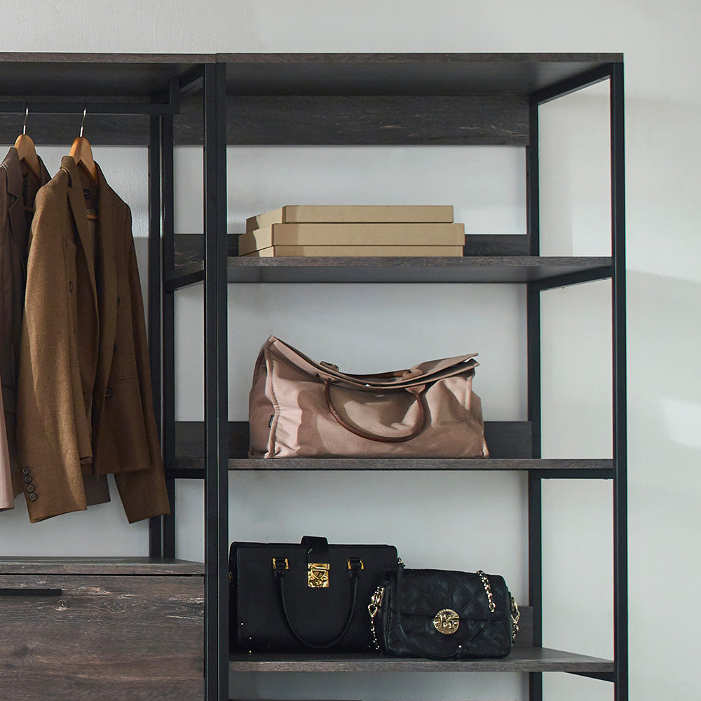 Two brown woolen coats hanging on a closet rack