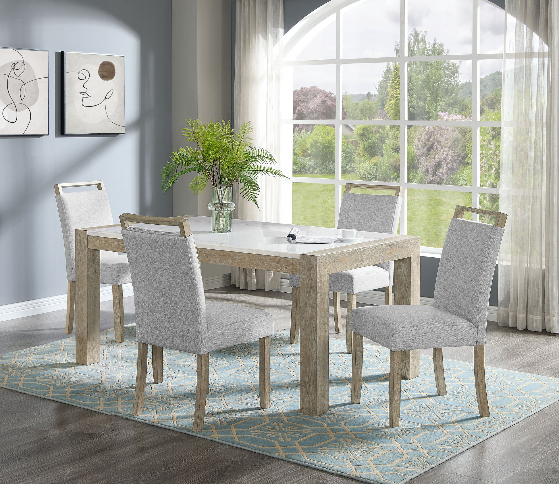 Light grey upholstered dining chairs with natural wood frame accents