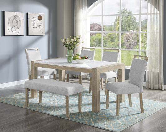 Modern white marble dining table with light oak legs and grey upholstered chairs