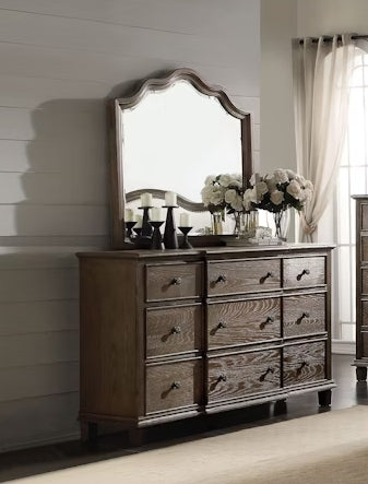 Rustic oak dresser with arched mirror and antique brass pulls