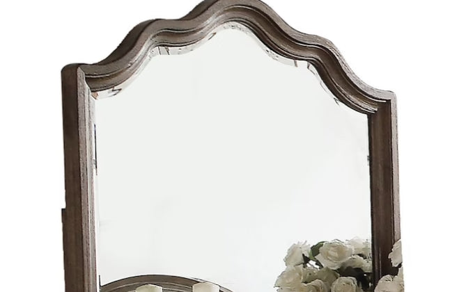 Distressed antique wood mirror with ornate scalloped top edge