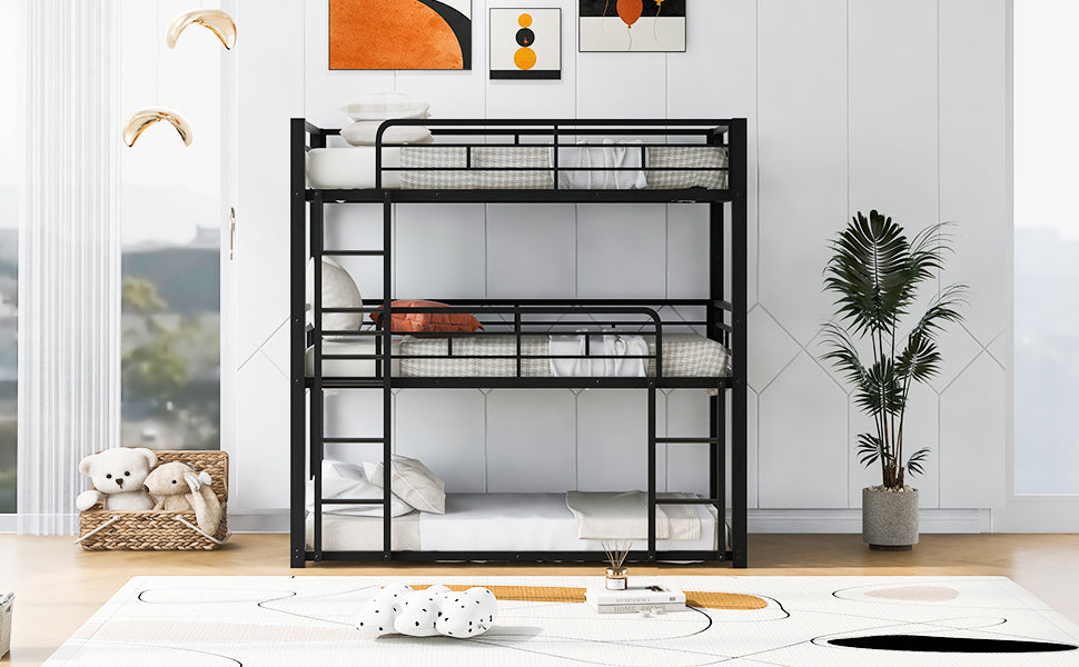 Black metal triple bunk bed with white mattresses and pillows