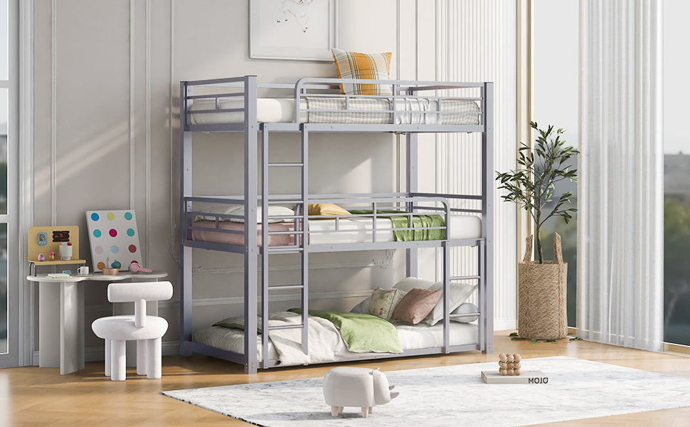 Gray metal triple bunk bed with green and pink bedding