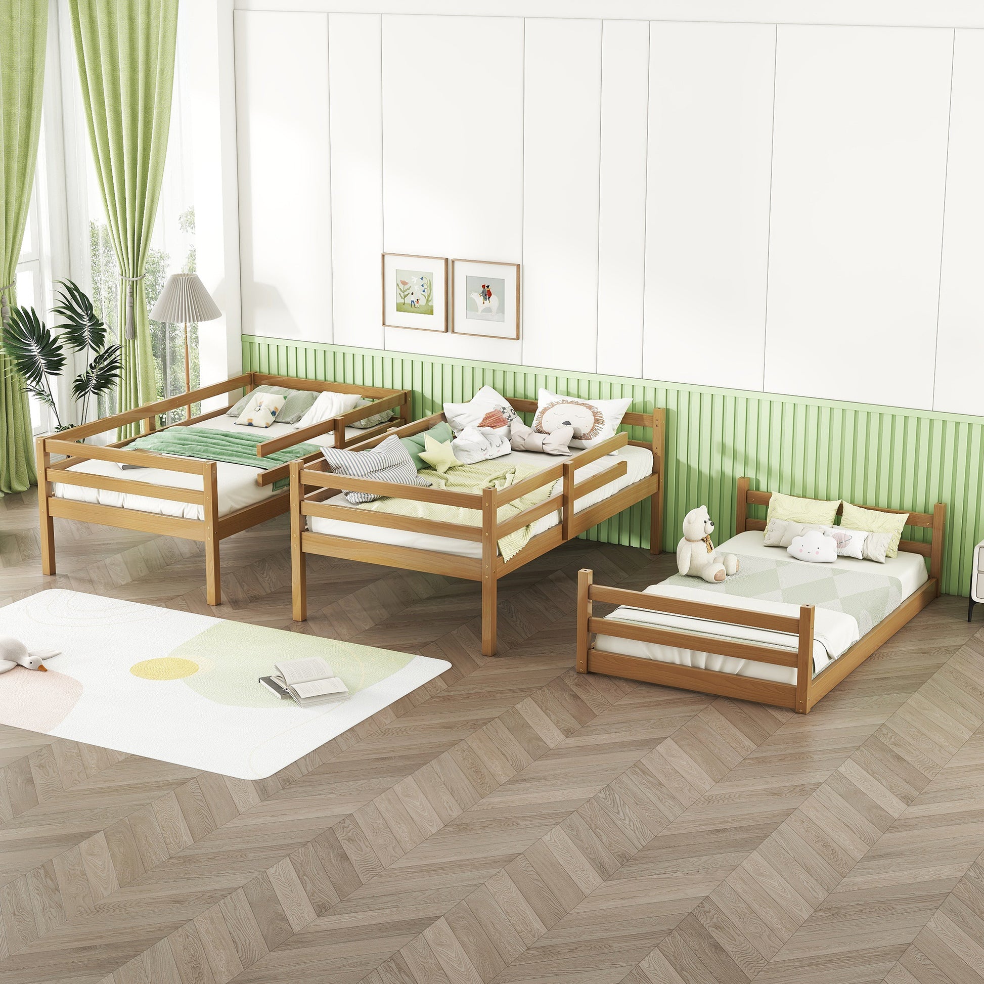 Wooden toddler bed with rails and green bedding
