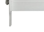 Closeup of white wooden bed frame leg and side rail